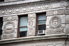02-08 Close Up Of The Carvings Around The Windows On The Side Of The Flatiron Building In New York Madison Square Park.jpg